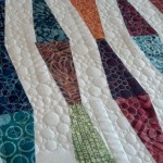 Pebbles and Bar quilting