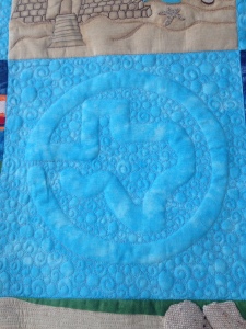 custom quilted TDA logo