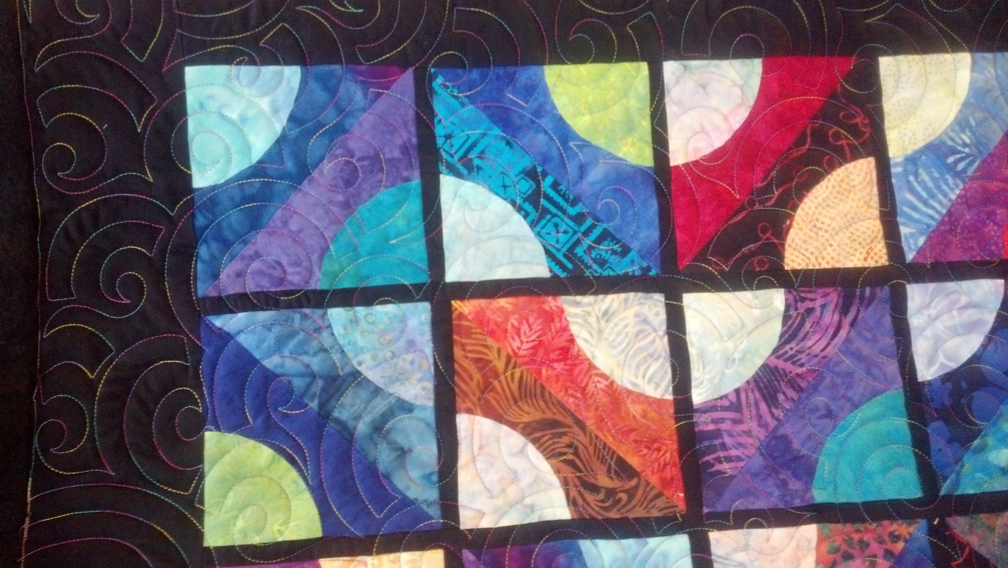Freehand longarm quilting by Maria Denise Hall